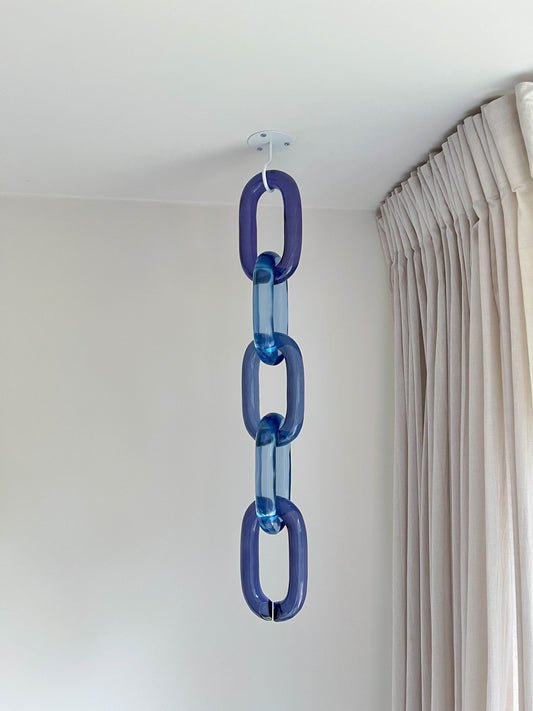 Modular oversized acrylic chain links wall decor by BRISÉNN