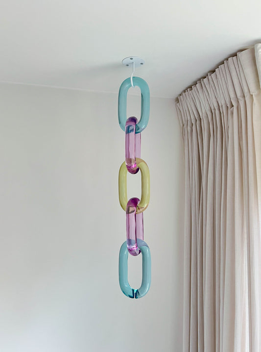 Modular oversized acrylic chain links wall decor by BRISÉNN