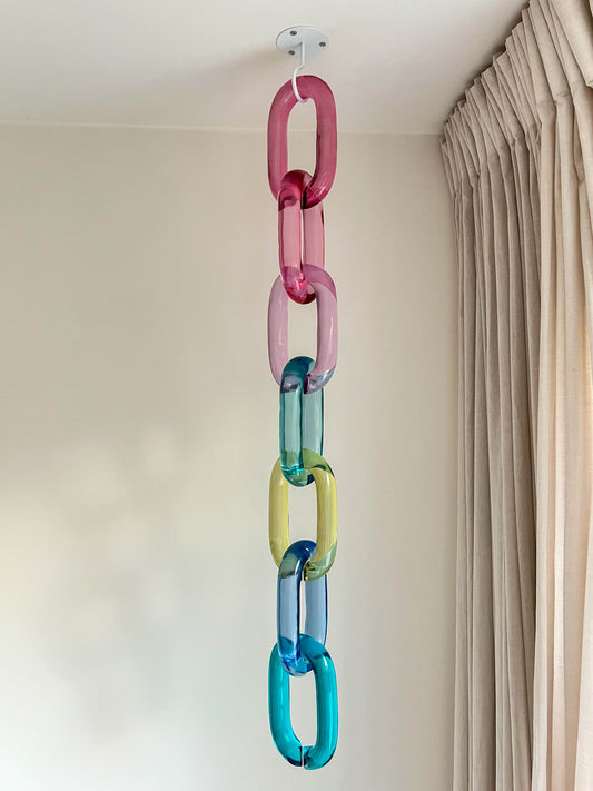 Modular oversized acrylic chain links wall decor by BRISÉNN